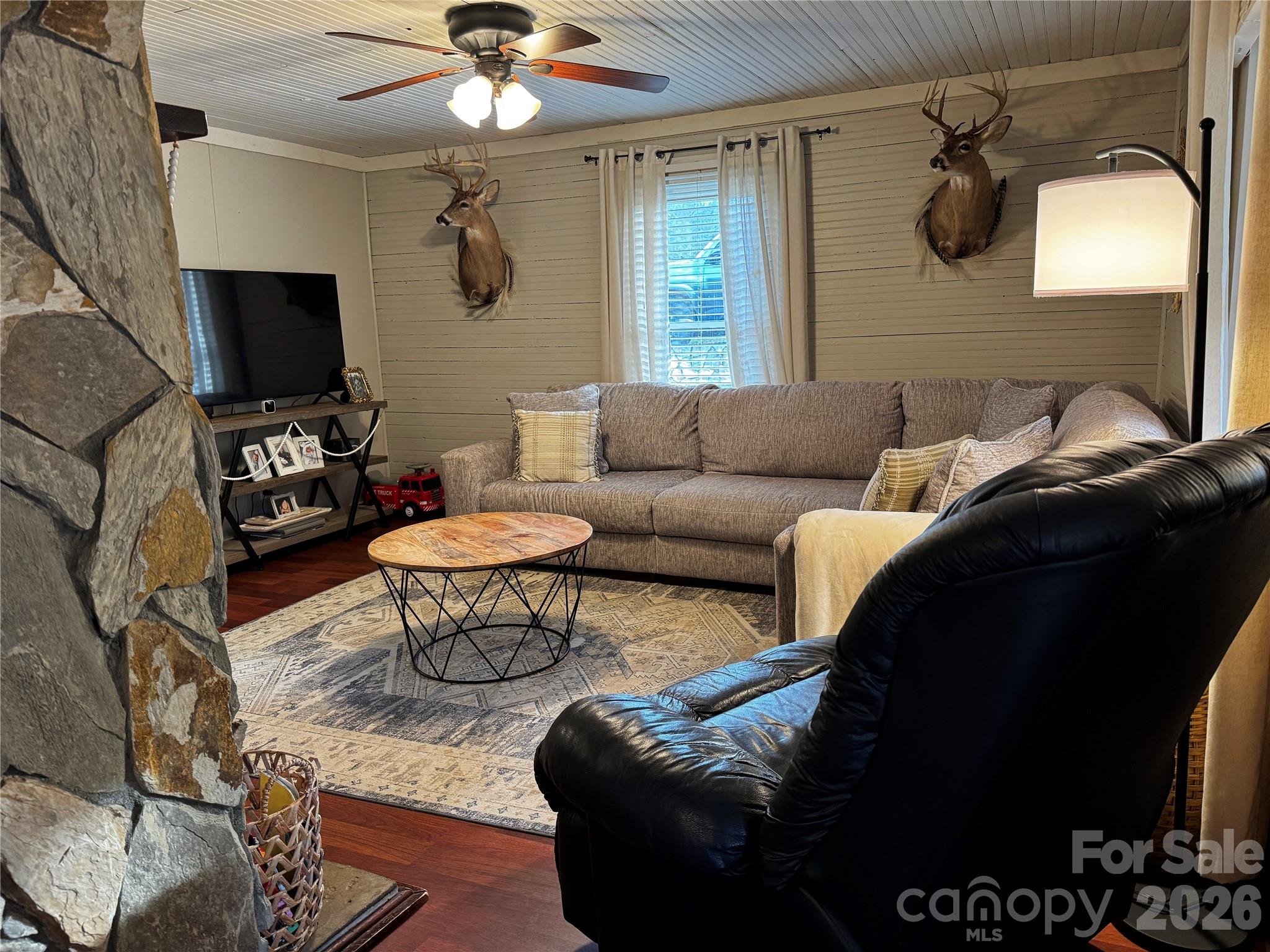 740 Moriah Church Road Casar, NC 28020 - Photo 15 of 31 a living room with furniture and a flat screen tv