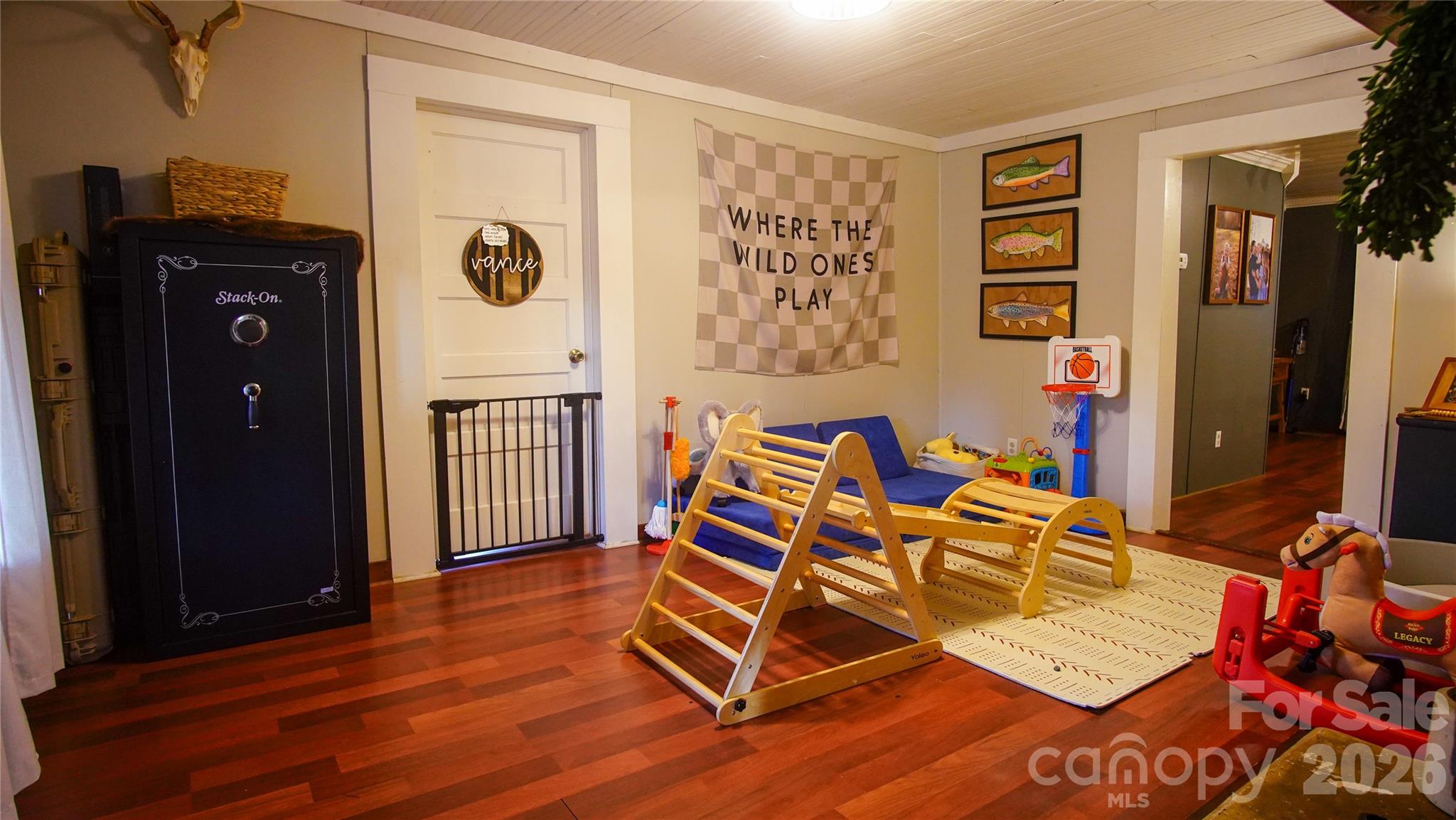 740 Moriah Church Road Casar, NC 28020 - Photo 19 of 31 a view of a workspace with furniture and wooden floor