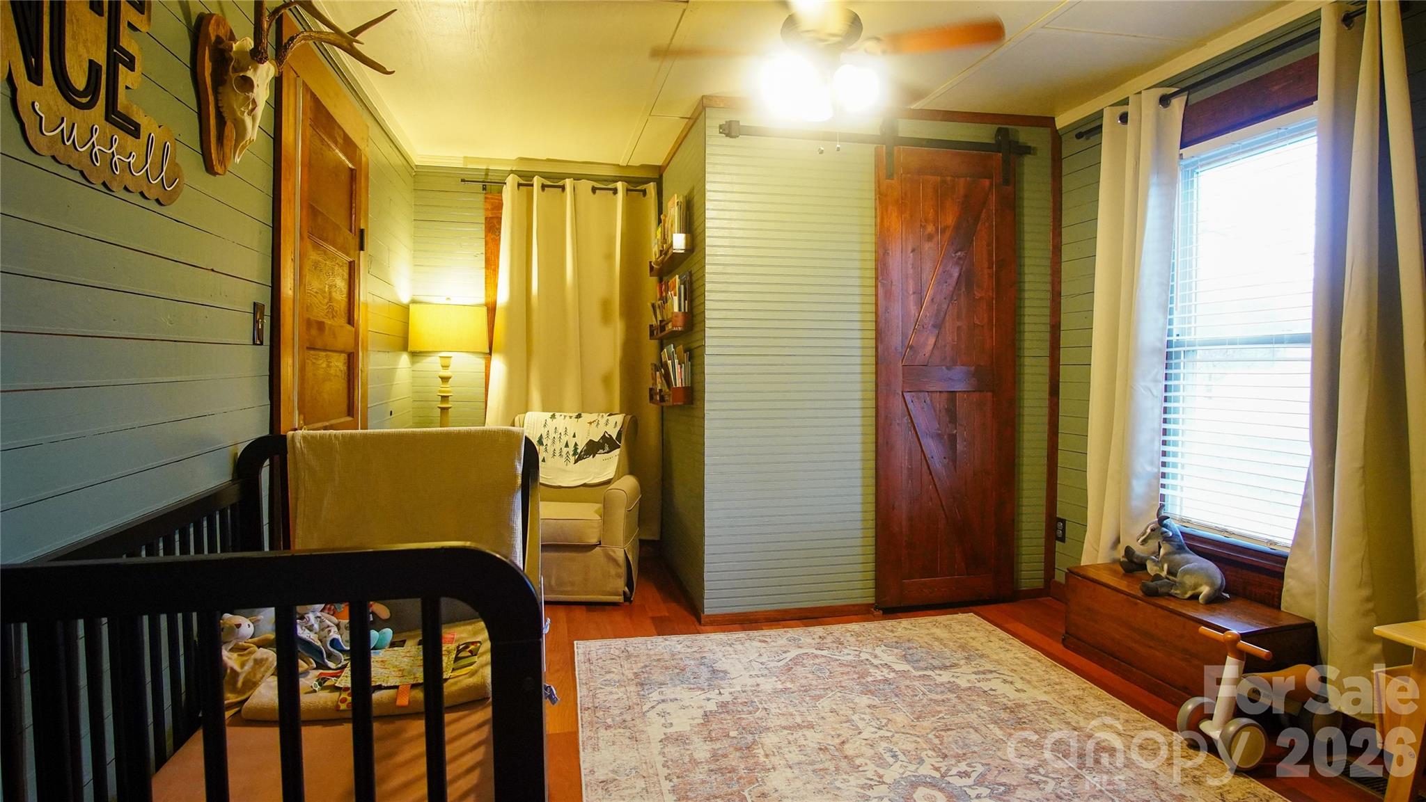 740 Moriah Church Road Casar, NC 28020 - Photo 20 of 31 a view of a porch with a table and chairs