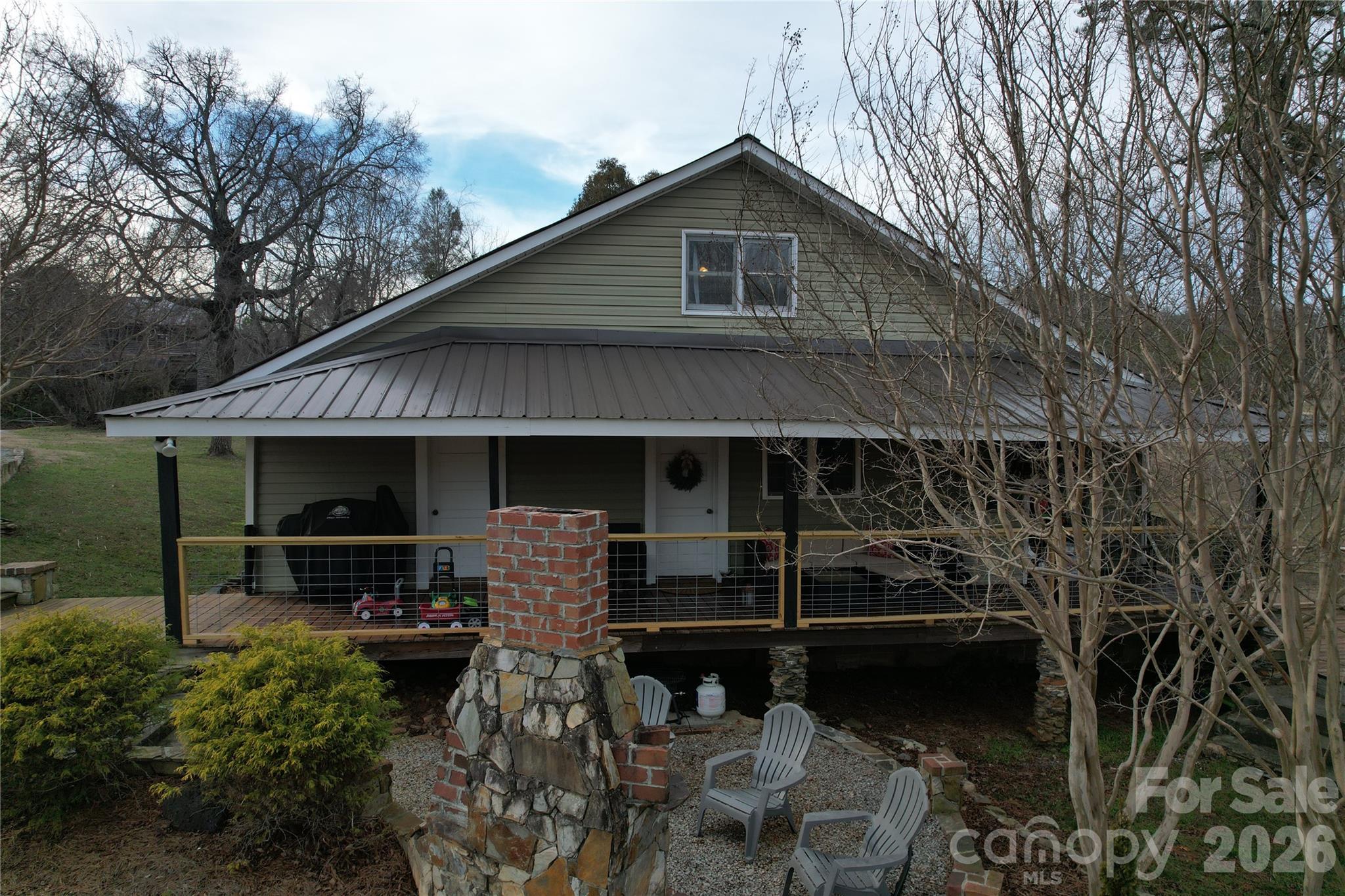740 Moriah Church Road Casar, NC 28020 - Photo 2 of 31 a front view of a house with patio