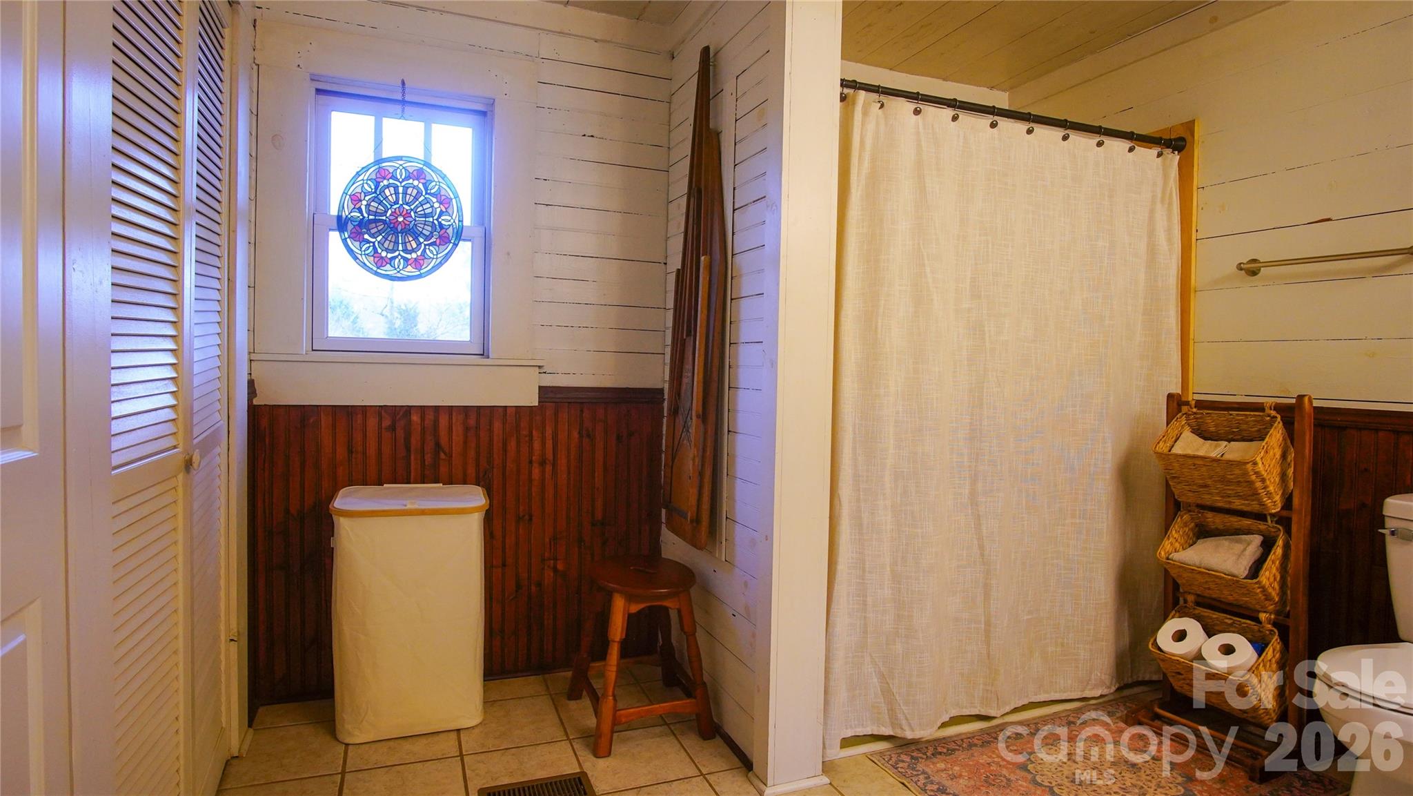 740 Moriah Church Road Casar, NC 28020 - Photo 26 of 31 a bathroom with a toilet and a shower curtain