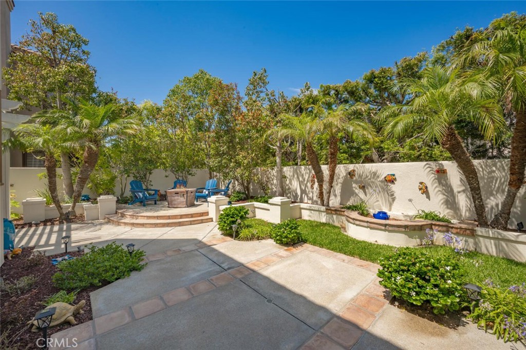 6546 Morningside Drive Huntington Beach, CA 92648 - Photo 14 of 74 a view of a swimming pool with a patio