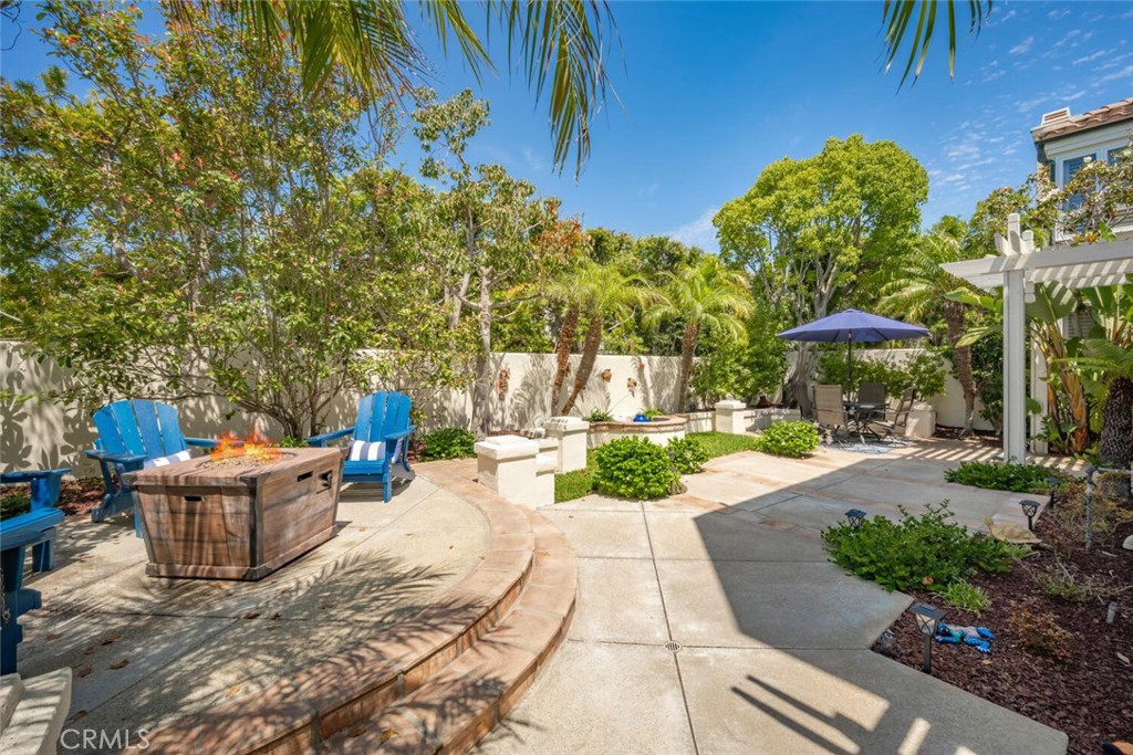 6546 Morningside Drive Huntington Beach, CA 92648 - Photo 16 of 74 a view of a backyard with plants and a patio