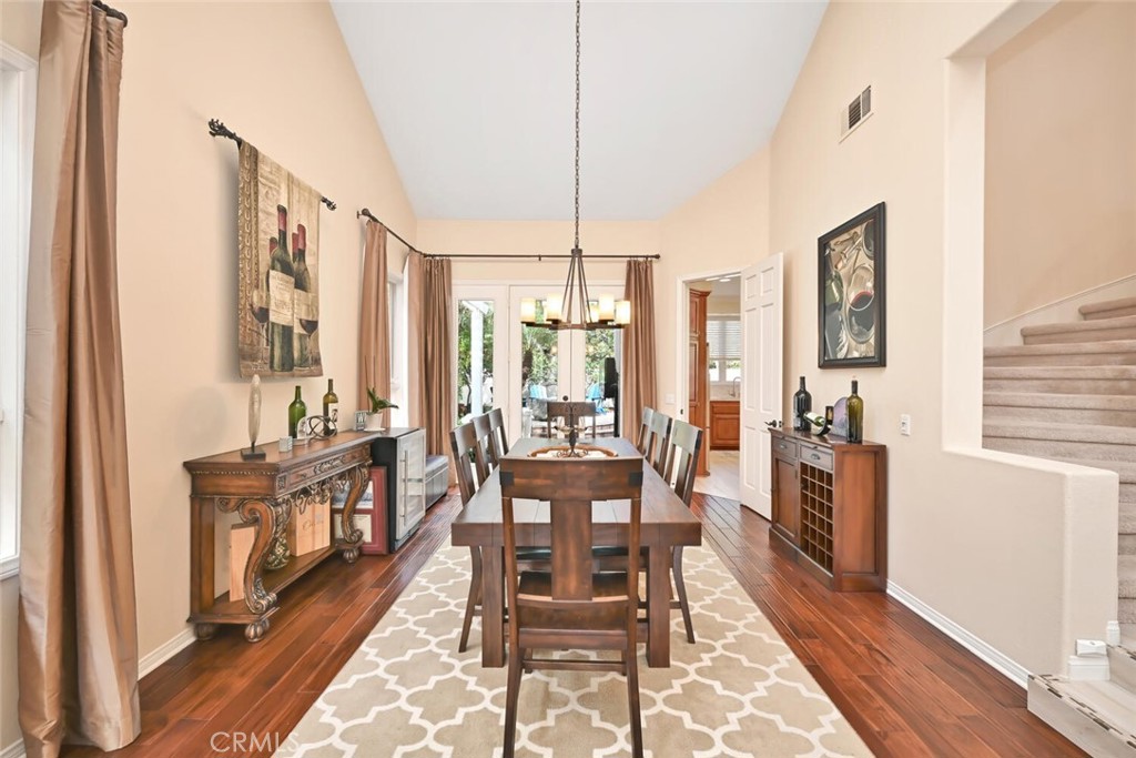 6546 Morningside Drive Huntington Beach, CA 92648 - Photo 25 of 74 a view of a dining room with furniture window and wooden floor