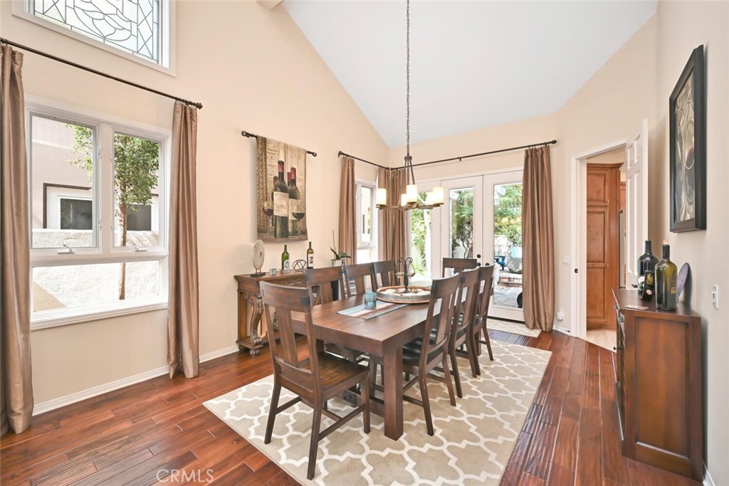 6546 Morningside Drive Huntington Beach, CA 92648 - Photo 26 of 74 a view of a dining room with furniture window and wooden floor