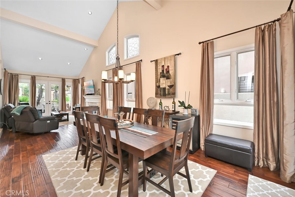 6546 Morningside Drive Huntington Beach, CA 92648 - Photo 27 of 74 a view of a dining room with furniture and wooden floor