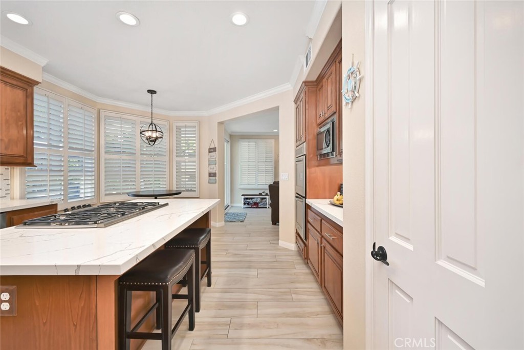 6546 Morningside Drive Huntington Beach, CA 92648 - Photo 35 of 74 a kitchen with a sink and cabinets