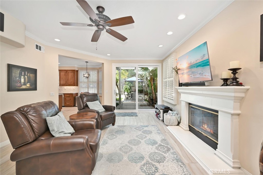 6546 Morningside Drive Huntington Beach, CA 92648 - Photo 40 of 74 a living room with furniture and a fireplace