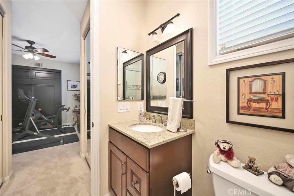 6546 Morningside Drive Huntington Beach, CA 92648 - Photo 58 of 74 a bathroom with a granite countertop sink mirror and tub