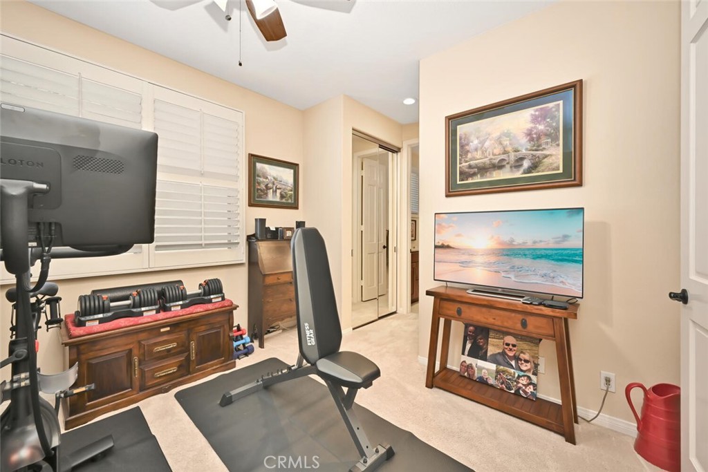 6546 Morningside Drive Huntington Beach, CA 92648 - Photo 60 of 74 a view of a room with gym equipment