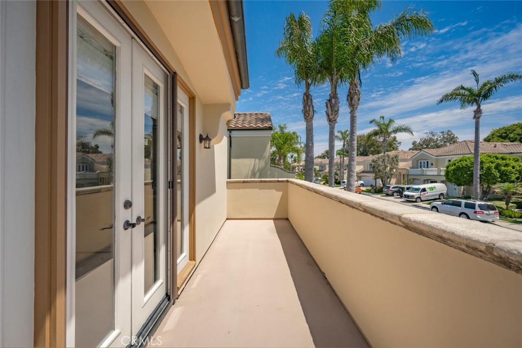 6546 Morningside Drive Huntington Beach, CA 92648 - Photo 66 of 74 a view of balcony with a potted plant