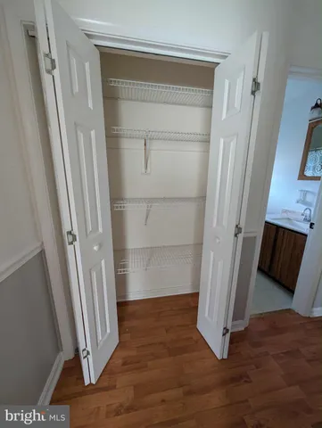a view of front door with wooden floor