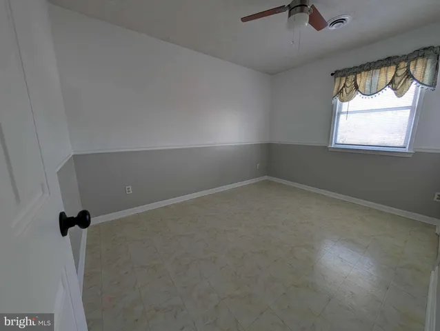 an empty room with a window