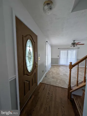 a view of a hallway with washer and dryer