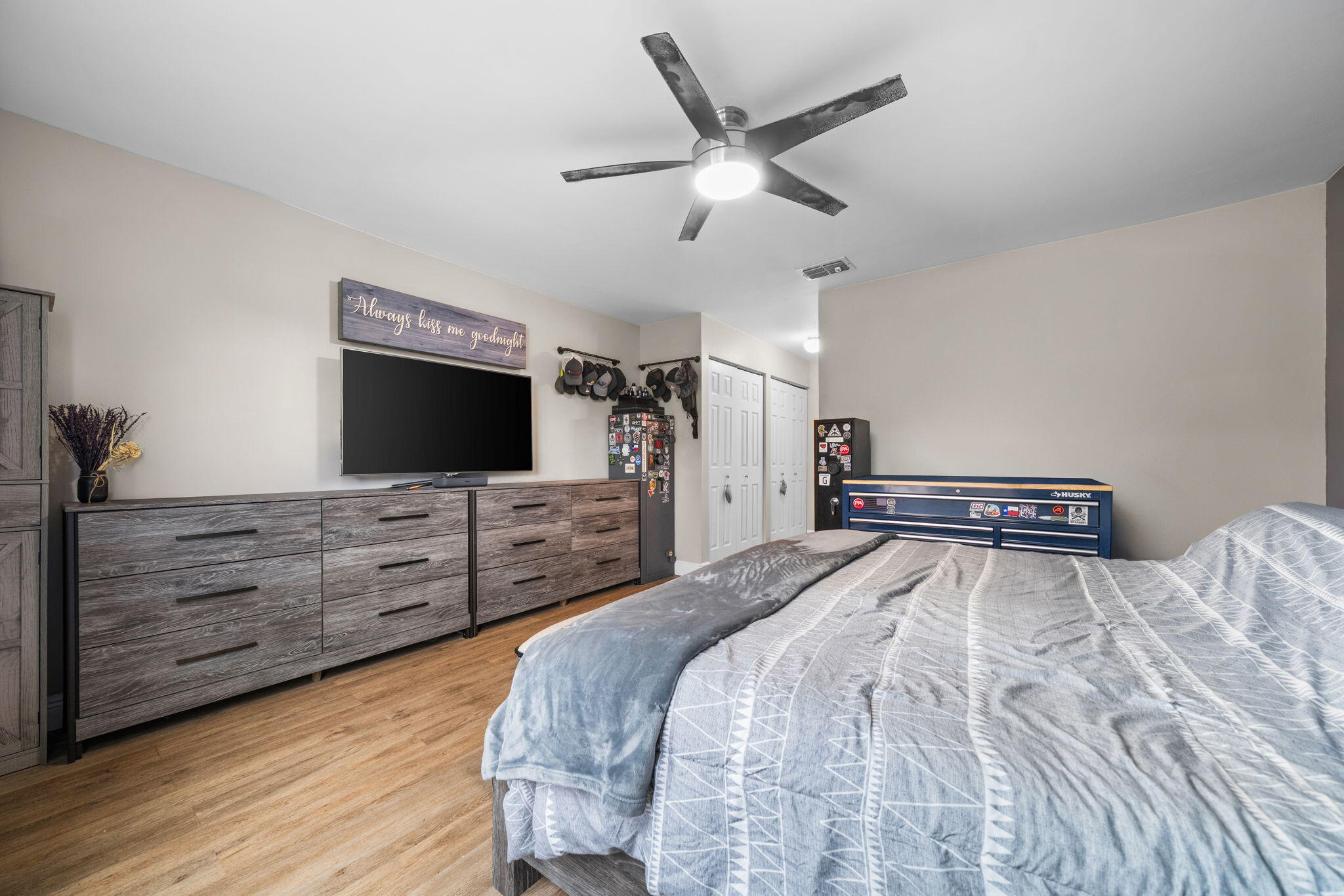 8374 Dynasty Drive Boca Raton, FL 33433 - Photo 12 of 30 a bedroom with a bed and a flat screen tv