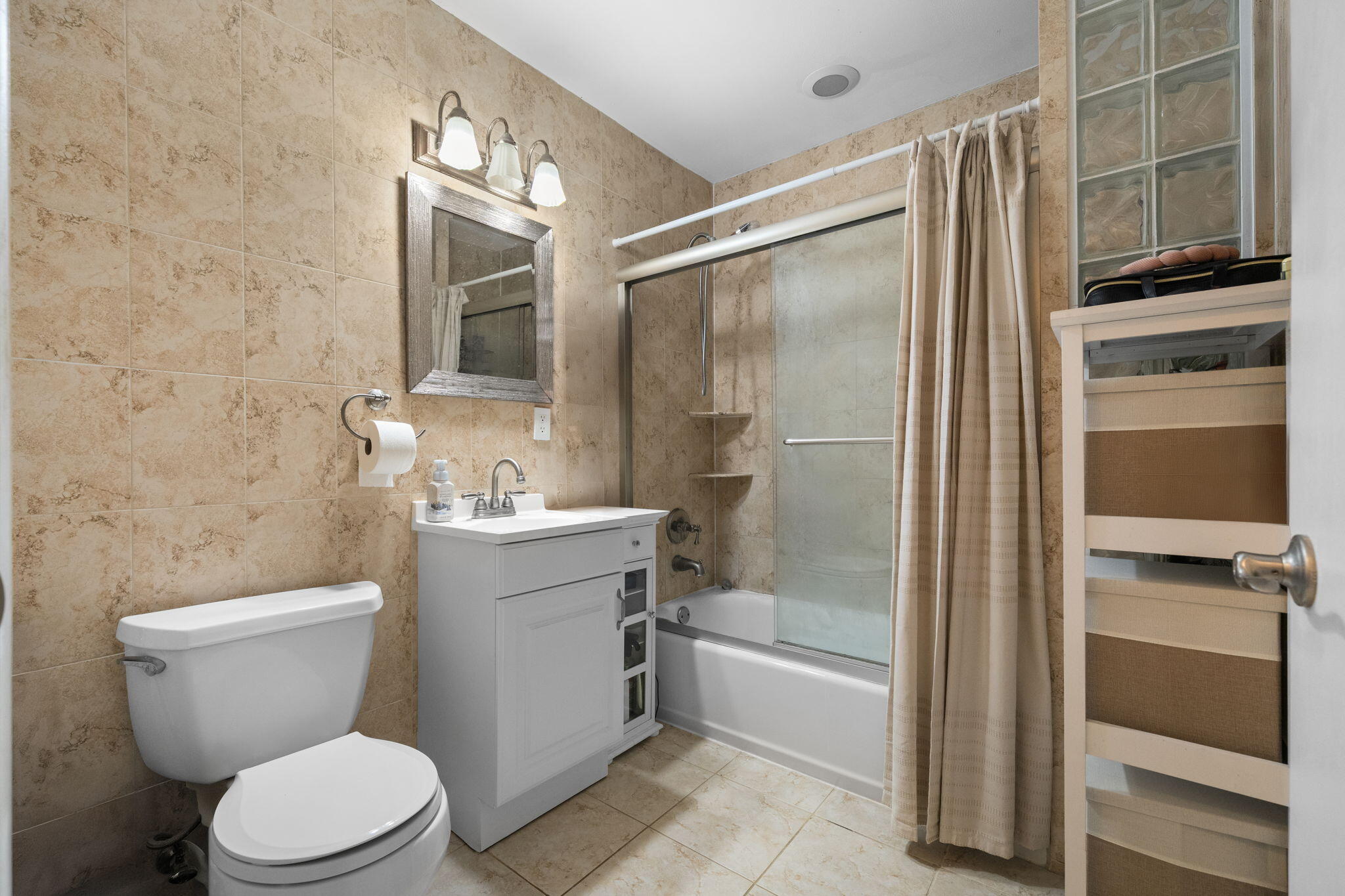8374 Dynasty Drive Boca Raton, FL 33433 - Photo 13 of 30 a bathroom with a granite countertop toilet sink and shower