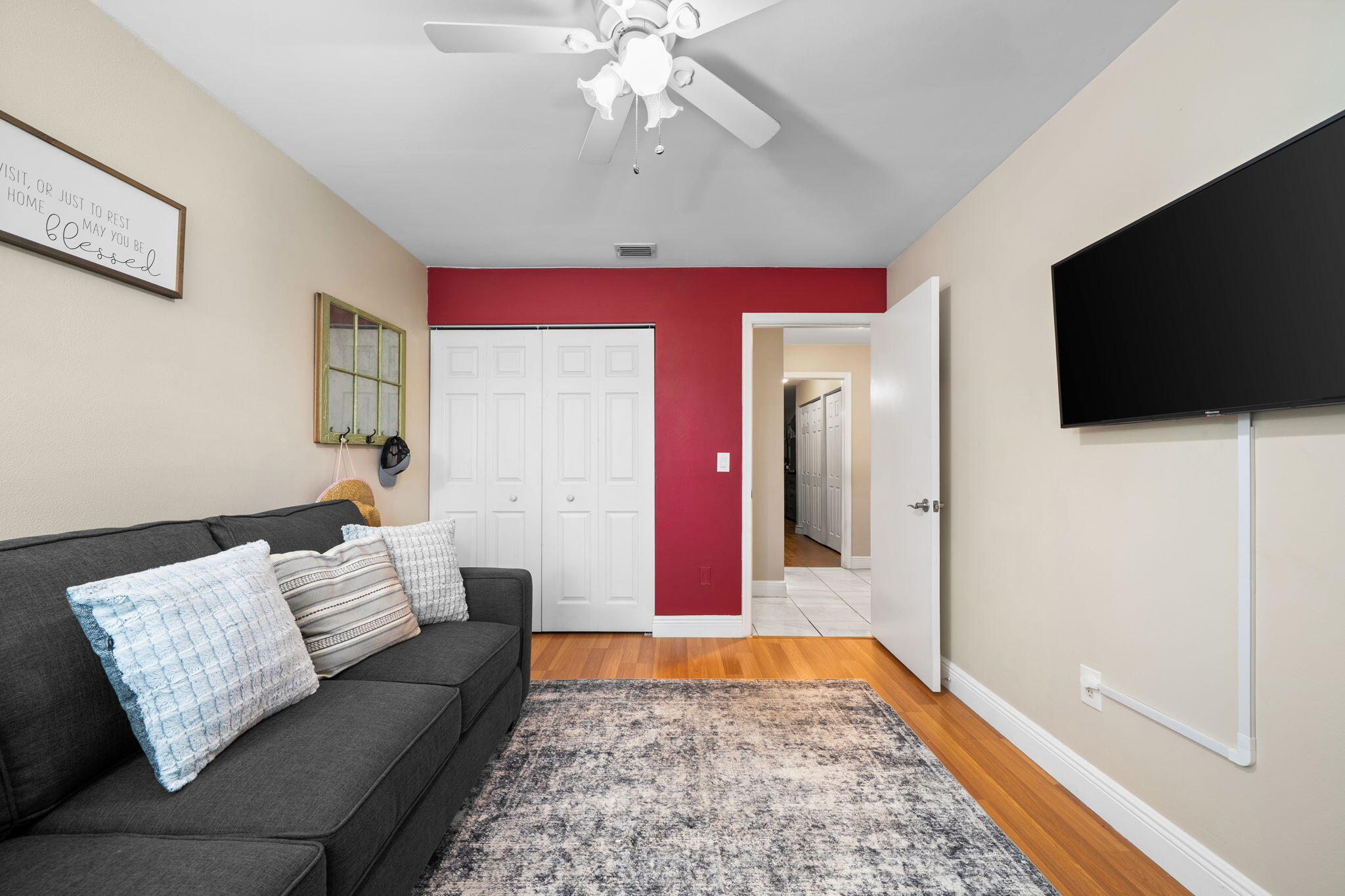 8374 Dynasty Drive Boca Raton, FL 33433 - Photo 17 of 30 a living room with furniture and a flat screen tv