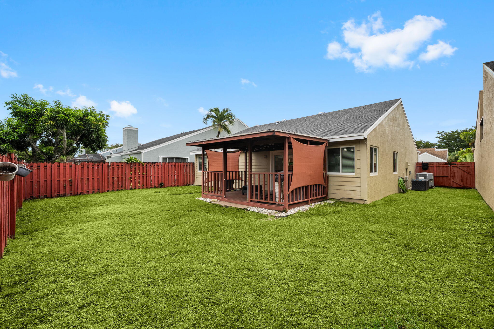 8374 Dynasty Drive Boca Raton, FL 33433 - Photo 24 of 30 a view of a house with a yard and sitting area