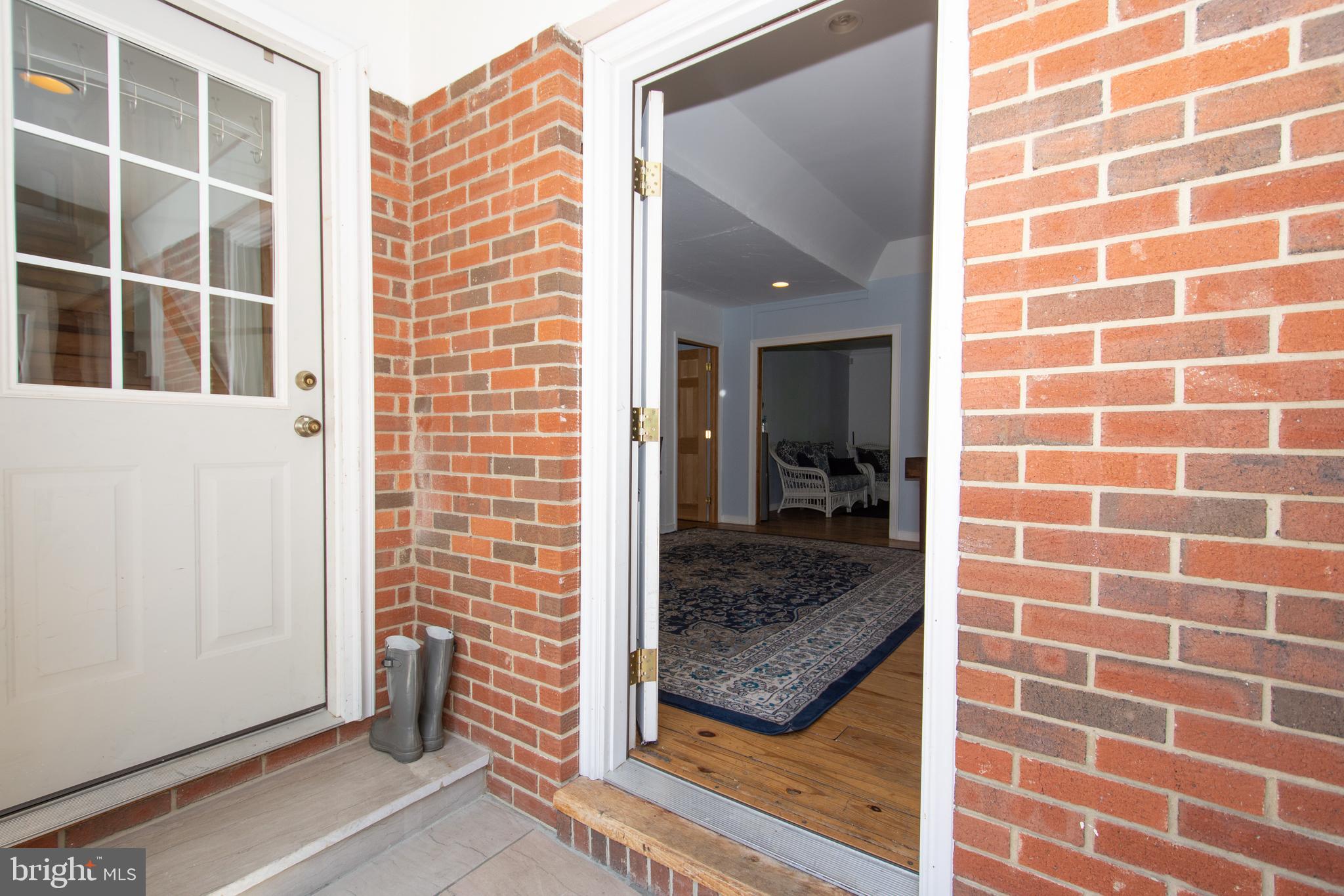 608 Charles Avenue Deale, MD 20751 - Photo 2 of 41 a view of a bathroom from a window