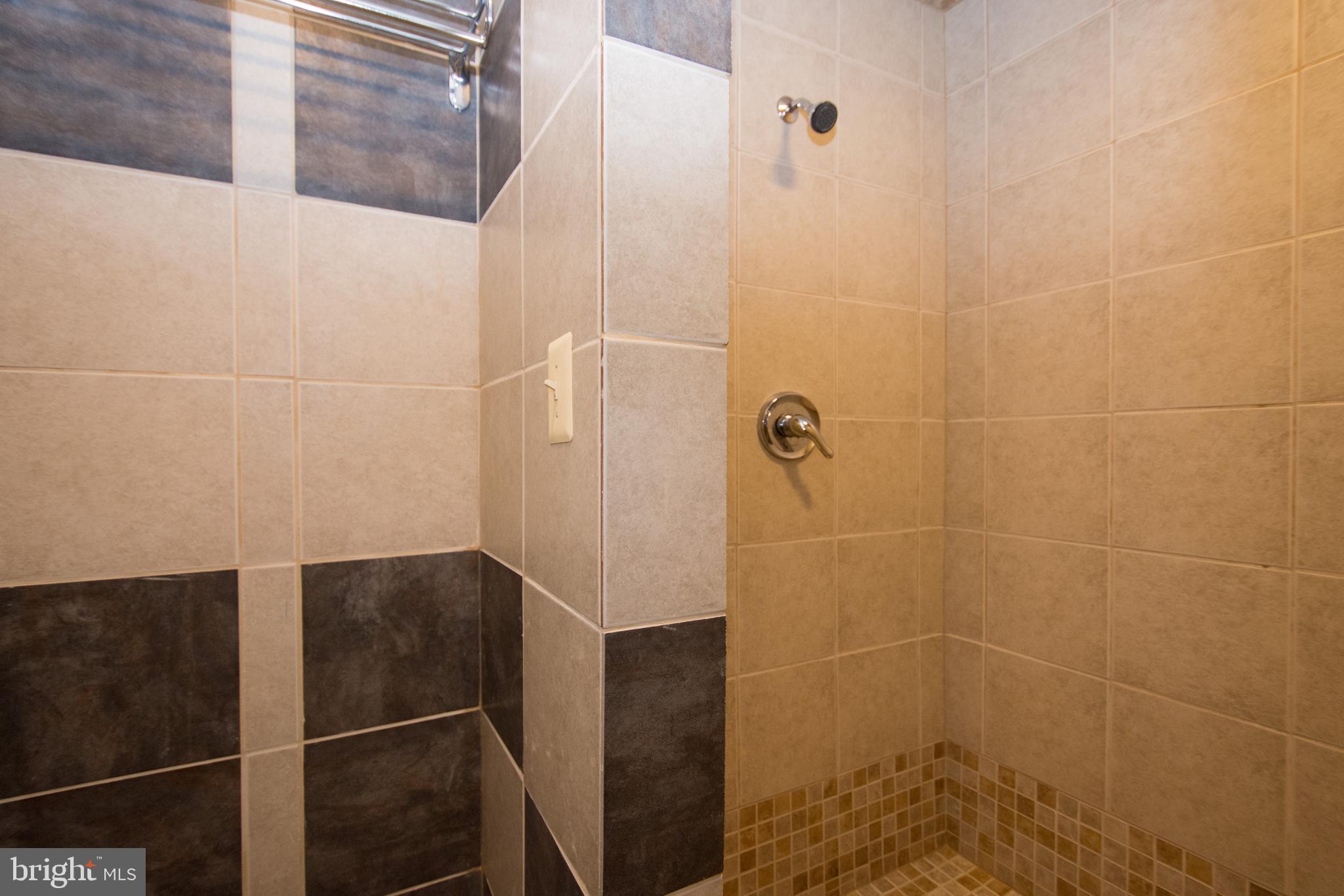 608 Charles Avenue Deale, MD 20751 - Photo 37 of 41 a bathroom with a shower