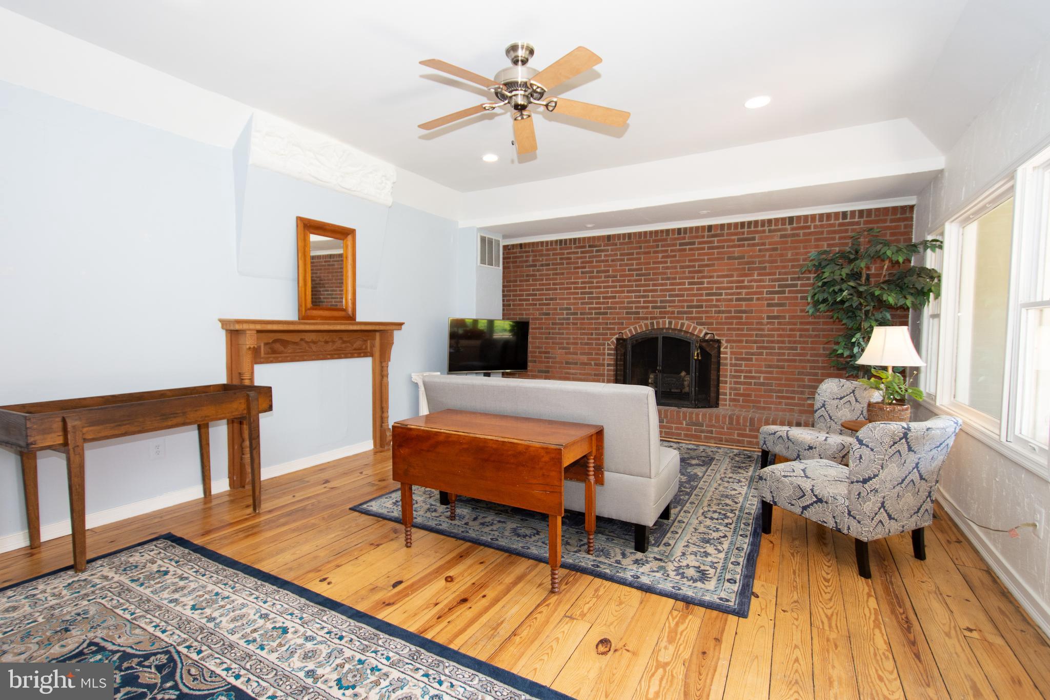 608 Charles Avenue Deale, MD 20751 - Photo 5 of 41 a living room with furniture and a rug