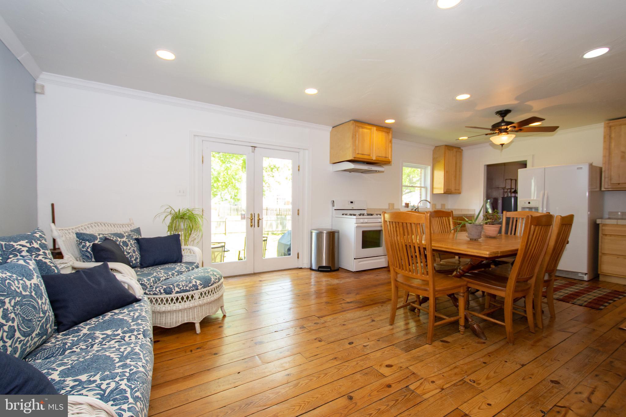 608 Charles Avenue Deale, MD 20751 - Photo 8 of 41 a living room with lots of furniture and kitchen view