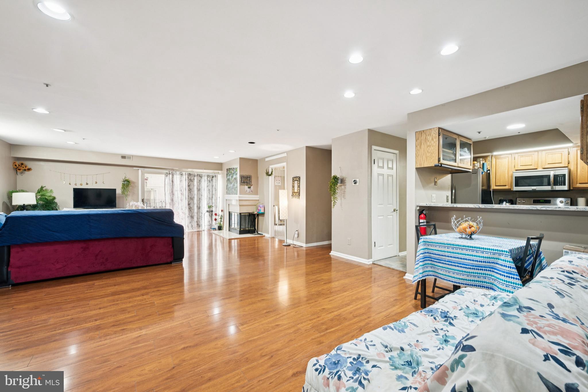 4023 Main Street Voorhees, NJ 08043 - Photo 26 of 28 a living room with furniture and a wooden floor