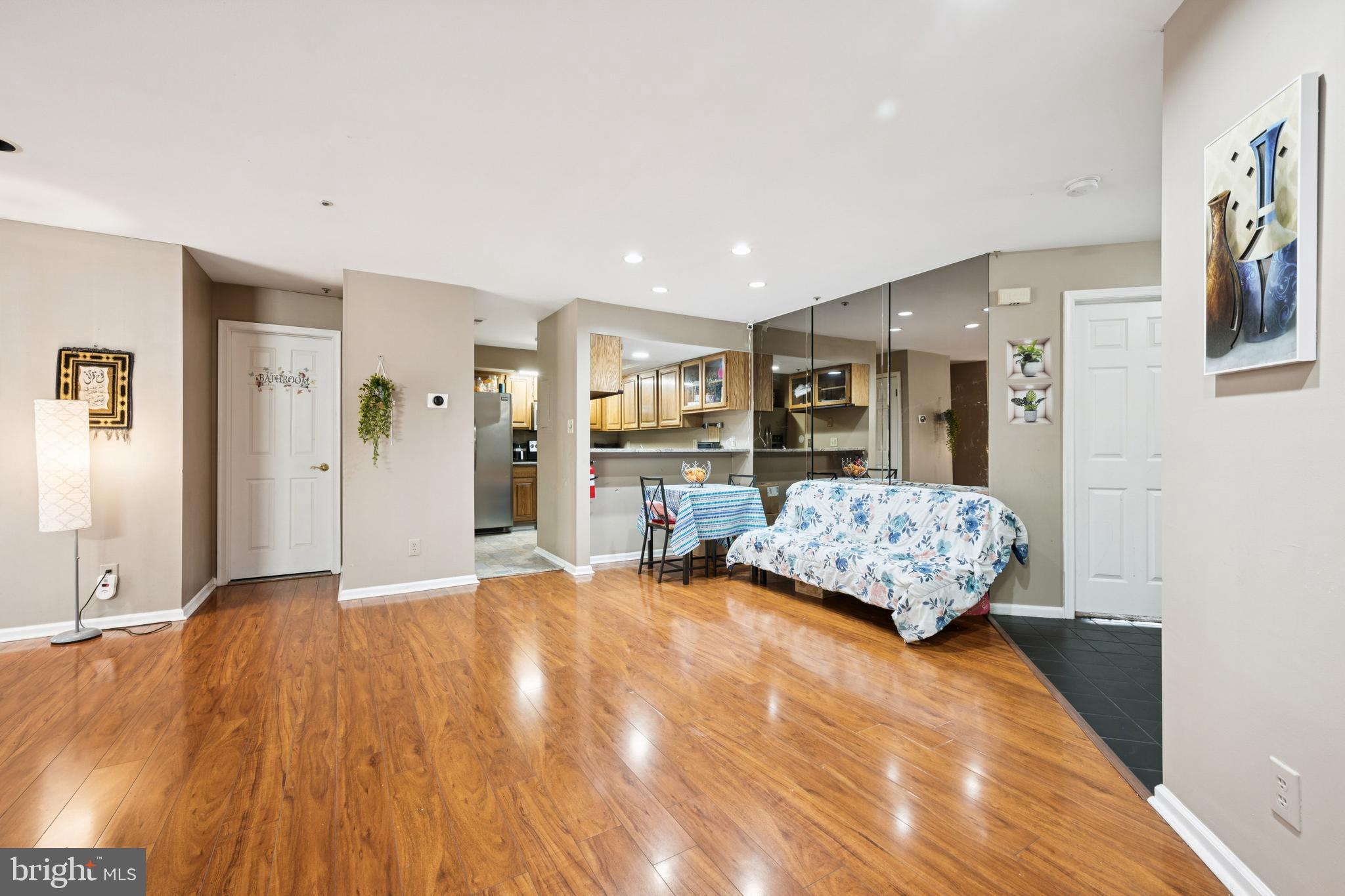 4023 Main Street Voorhees, NJ 08043 - Photo 27 of 28 a living room with furniture and large mirror