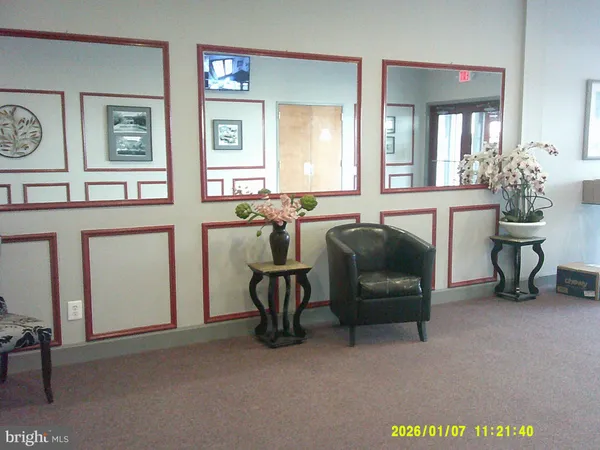 a view of a livingroom with furniture and a couch