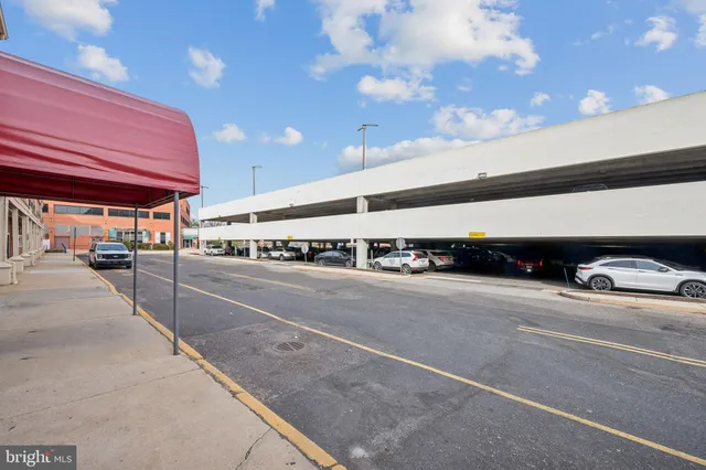 a view of a street with cars