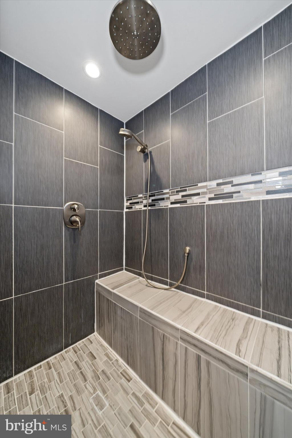 80 Welsh Tract Road, Unit G209 Newark, DE 19713 - Photo 22 of 26 a bathroom with a sink and a shower