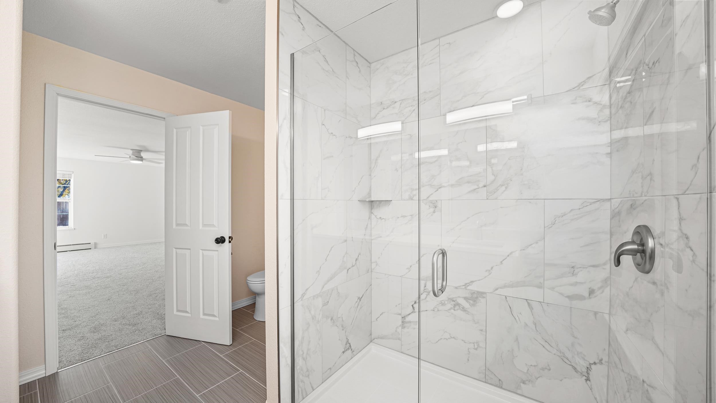 1631 Ptarmigan Ridge Court Grand Junction, CO 81506 - Photo 16 of 33 a bathroom with a shower