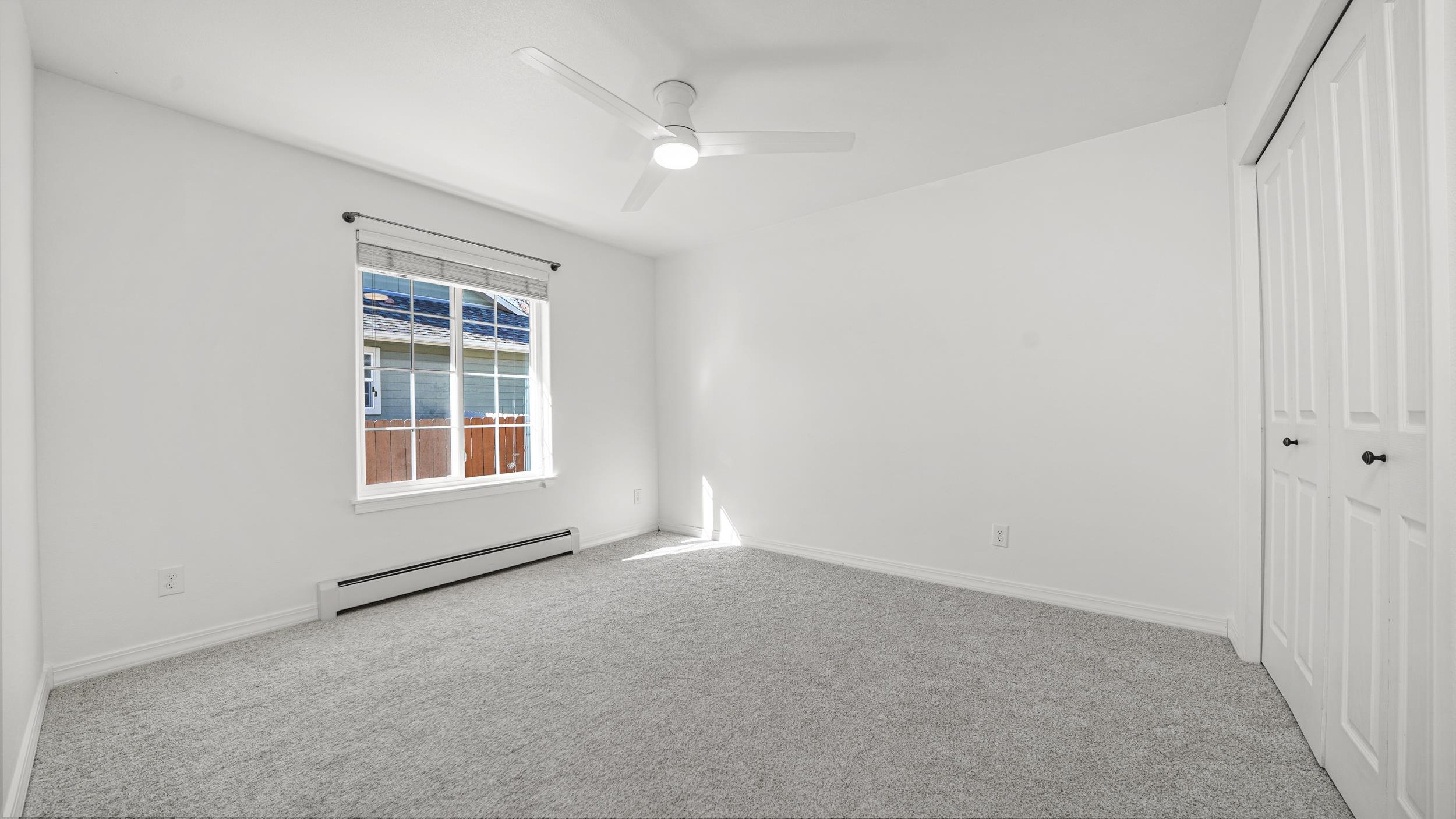 1631 Ptarmigan Ridge Court Grand Junction, CO 81506 - Photo 19 of 33 an empty room with windows