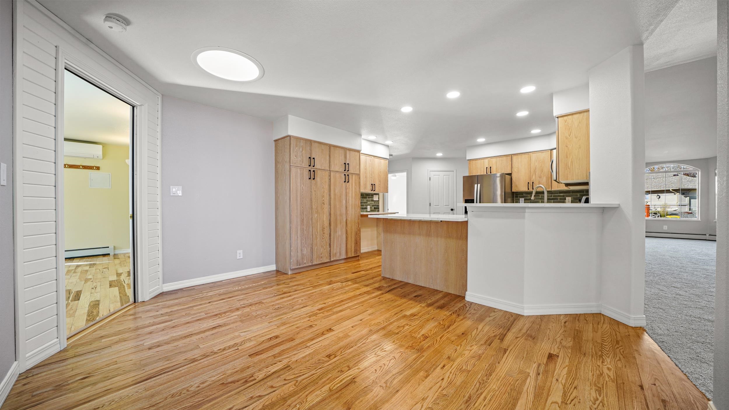 1631 Ptarmigan Ridge Court Grand Junction, CO 81506 - Photo 9 of 33 a view of a kitchen with wooden floor