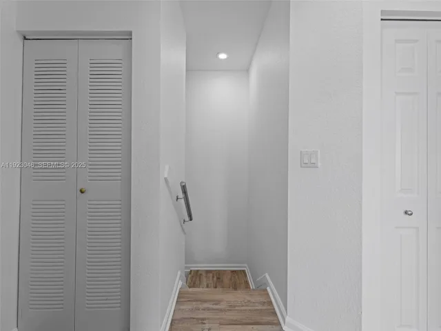 a view of a bathroom from the hallway