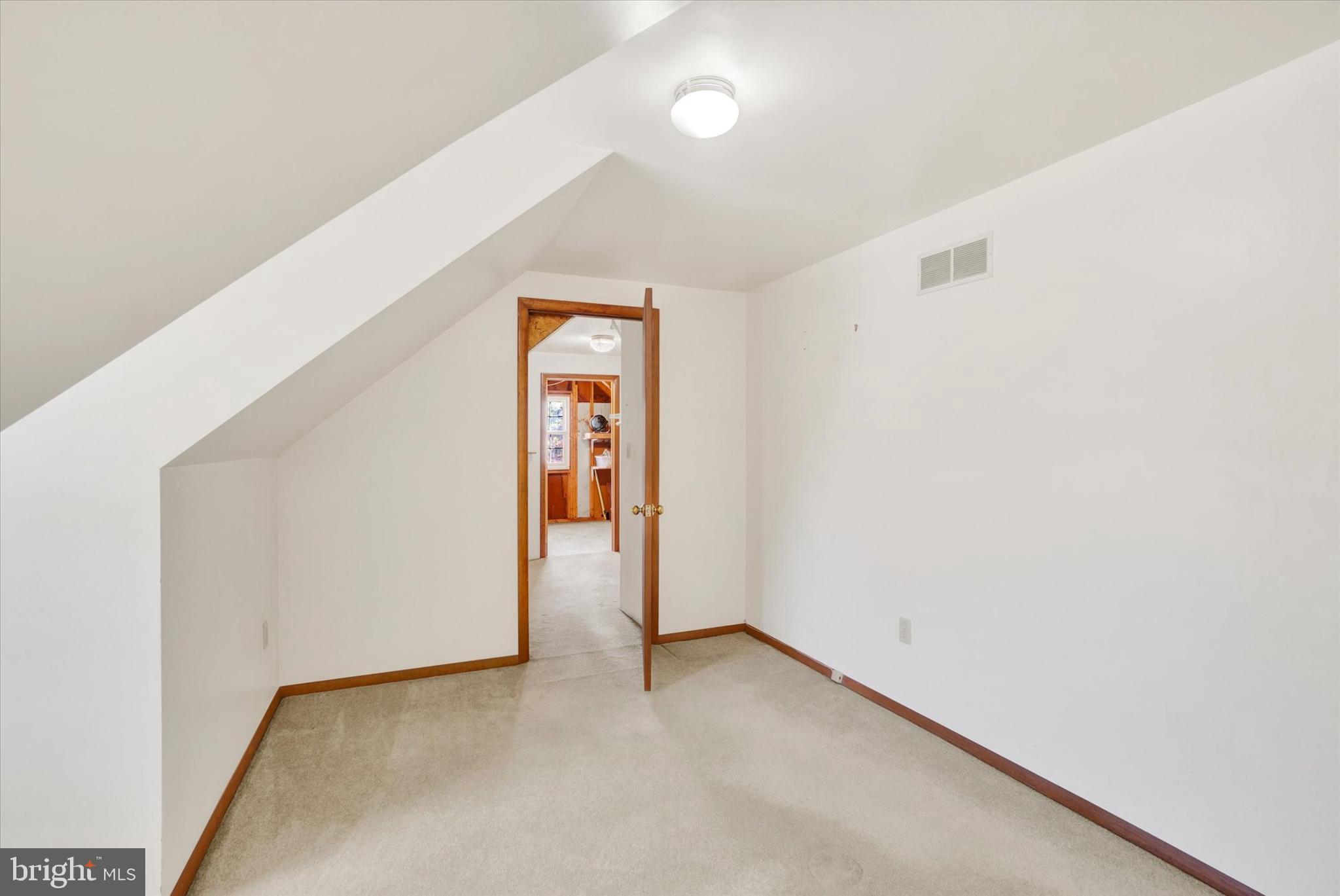 2976 Honey Valley Road Dallastown, PA 17313 - Photo 17 of 34 Walk-in Closet leading to Unfinished Attic Space