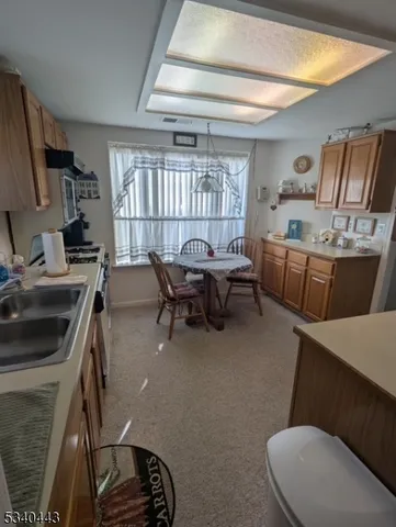 a workspace with furniture and a window