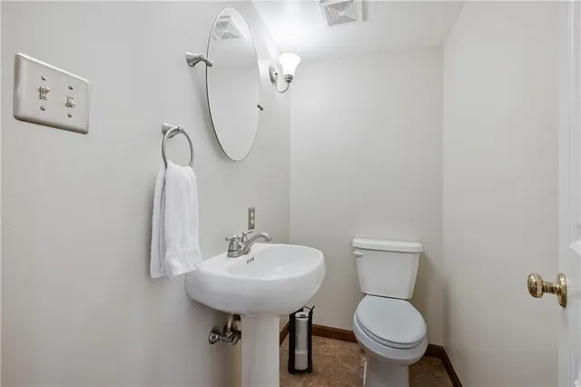 a work room with furniture and wooden floor