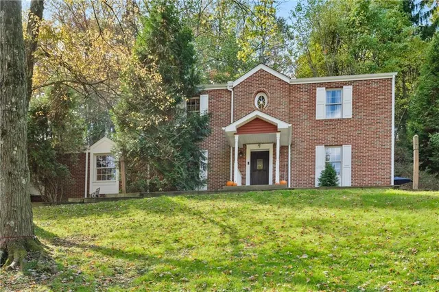 a view of a door and a window