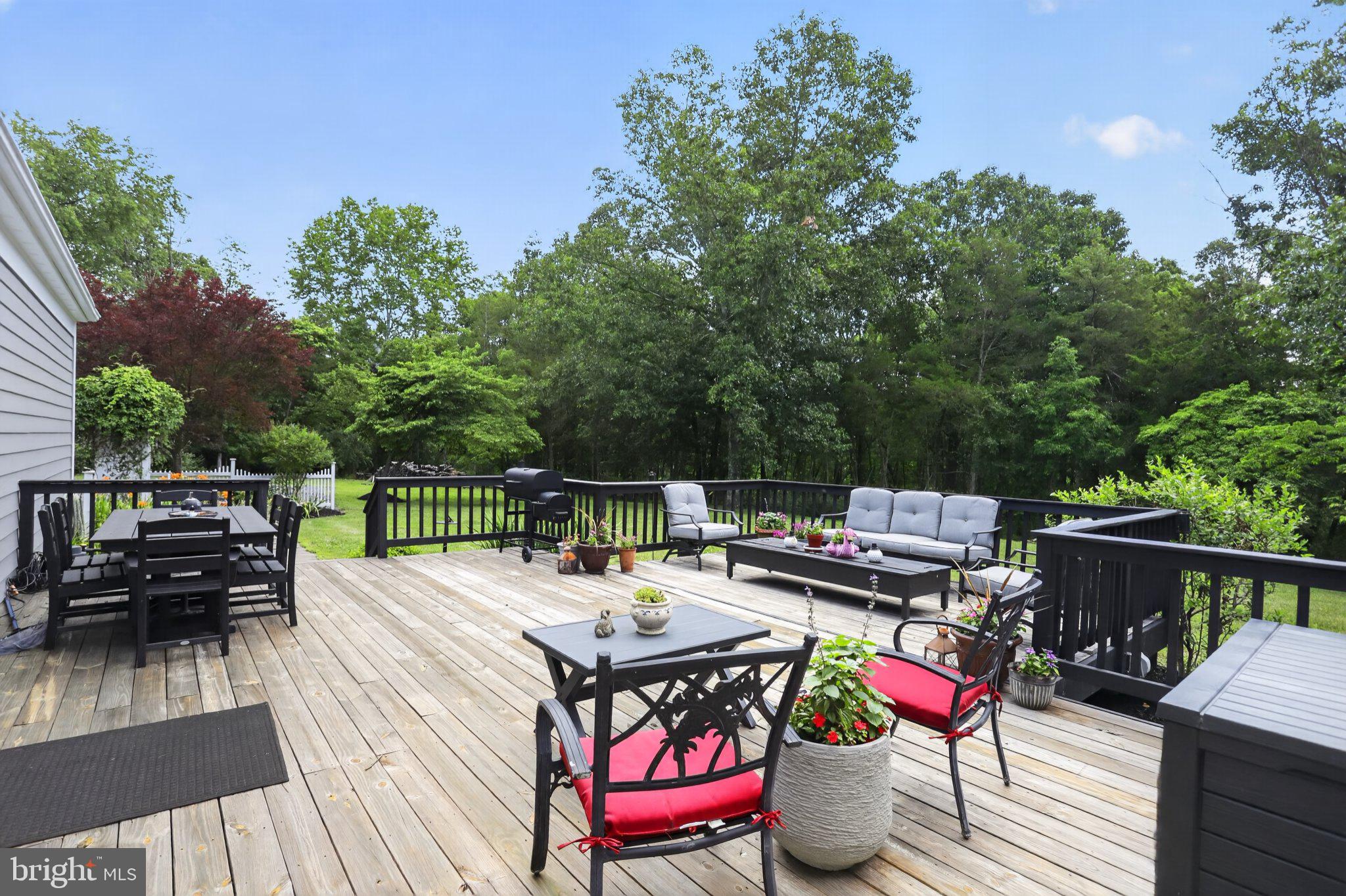 155 Seabrook Road Lambertville, NJ 08530 - Photo 38 of 44 Serene deck with lush green backdrop.