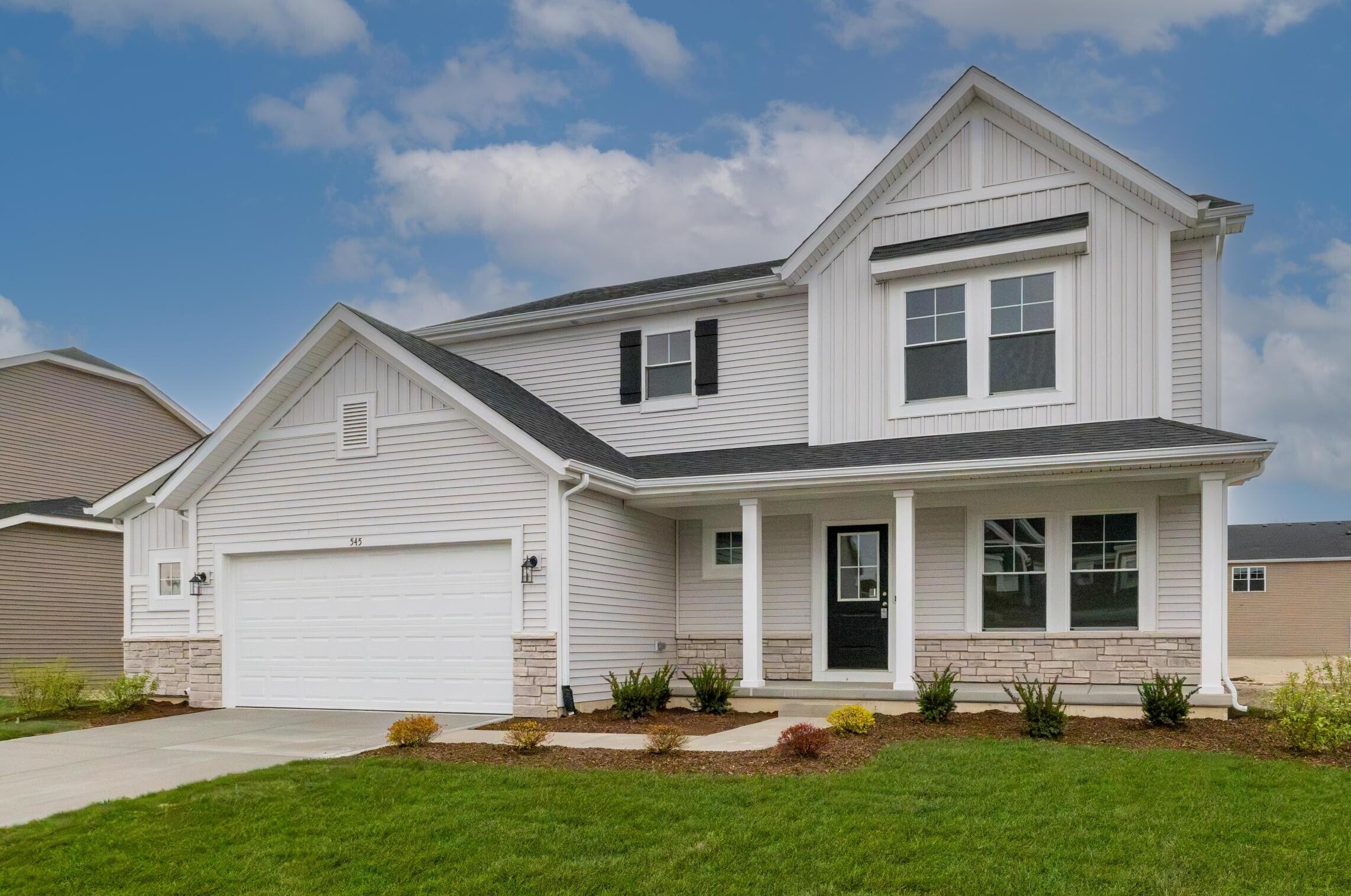 545 East 130th Place Crown Point, IN 46307 - Photo 2 of 25 a front view of the house with a yard
