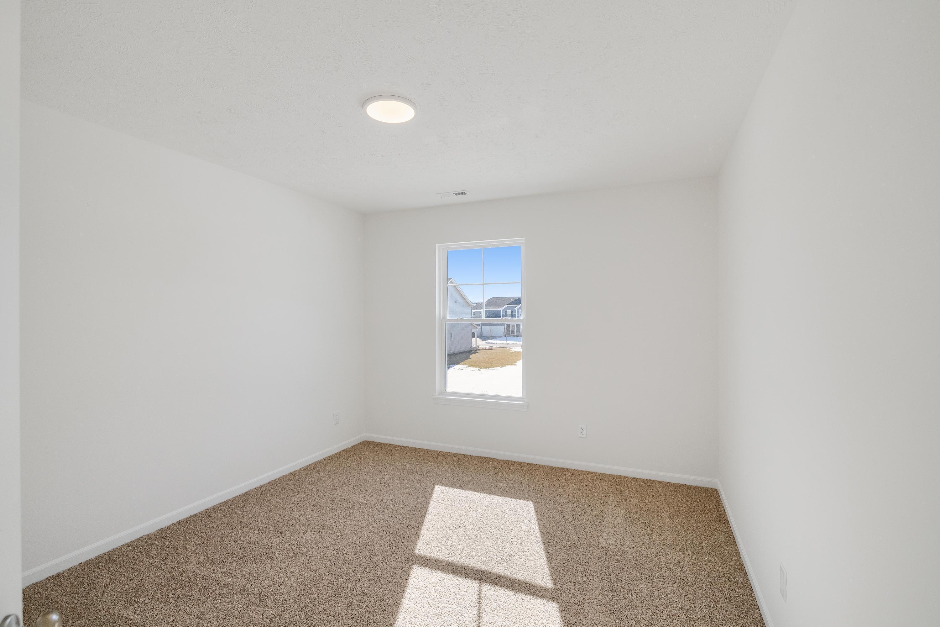545 East 130th Place Crown Point, IN 46307 - Photo 22 of 25 an empty room with a window