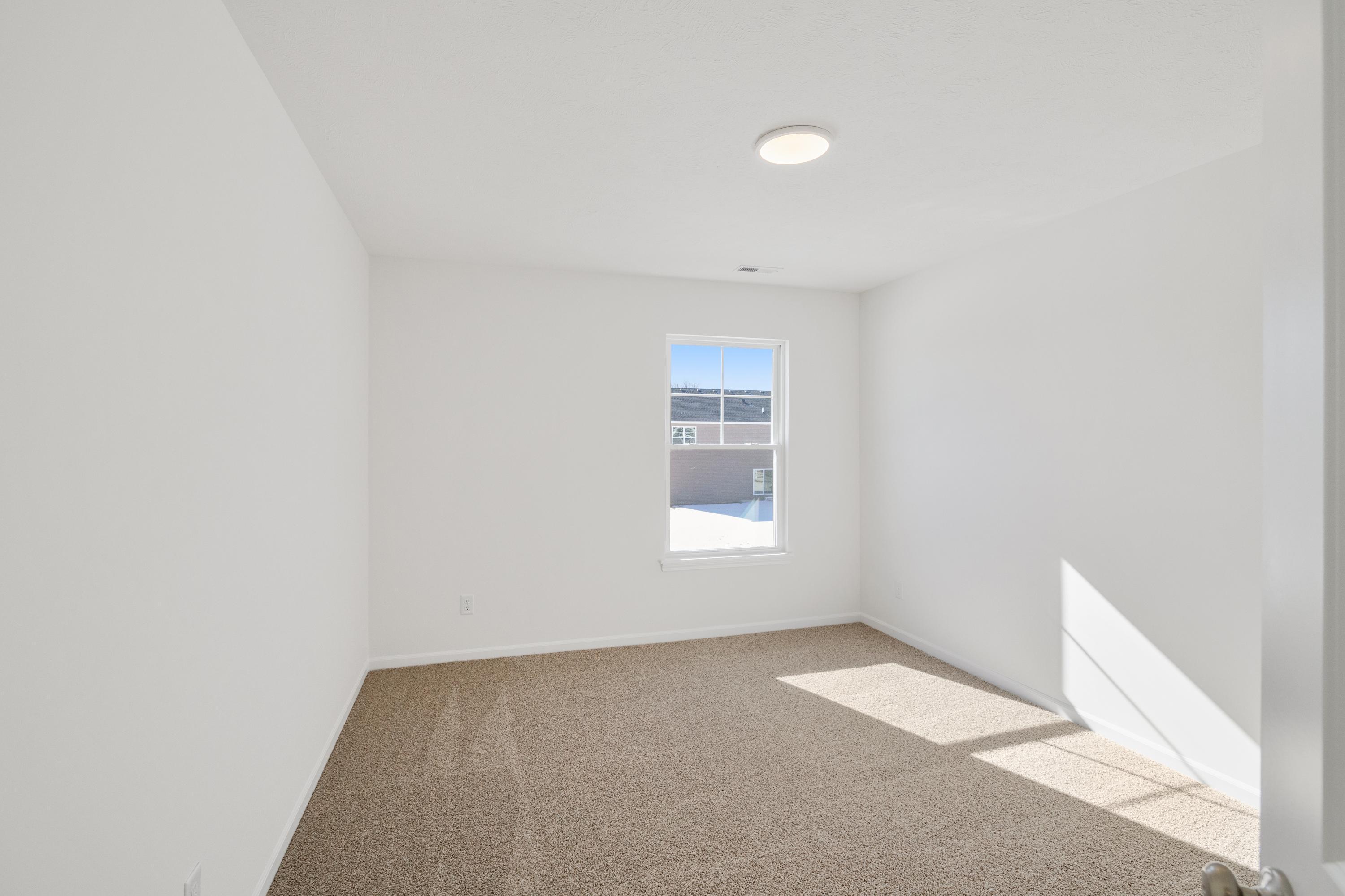 545 East 130th Place Crown Point, IN 46307 - Photo 23 of 25 a view of empty room with windows