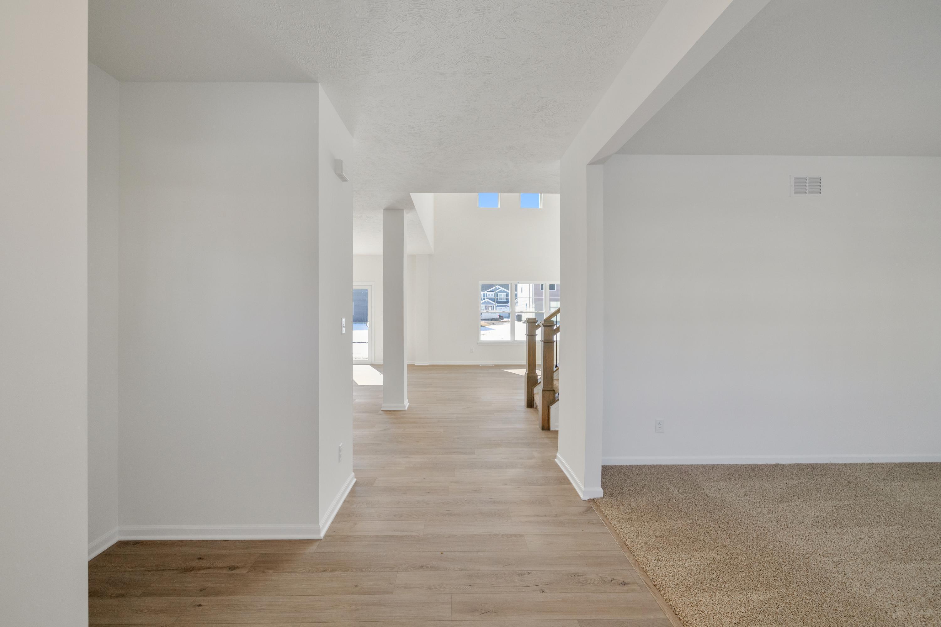 545 East 130th Place Crown Point, IN 46307 - Photo 4 of 25 a view of a room with wooden floor