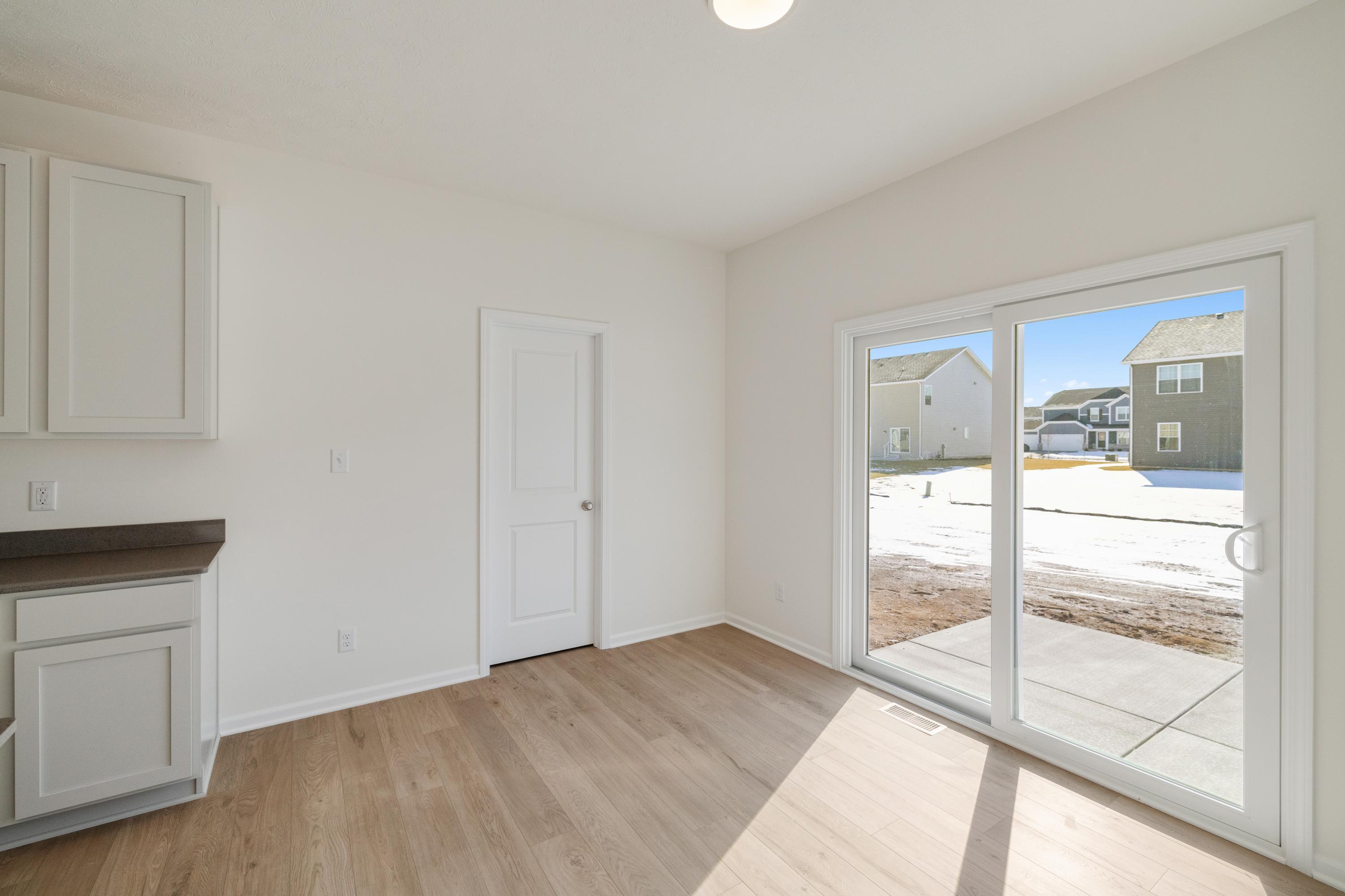 545 East 130th Place Crown Point, IN 46307 - Photo 10 of 25 a view of a room that has a bed in it