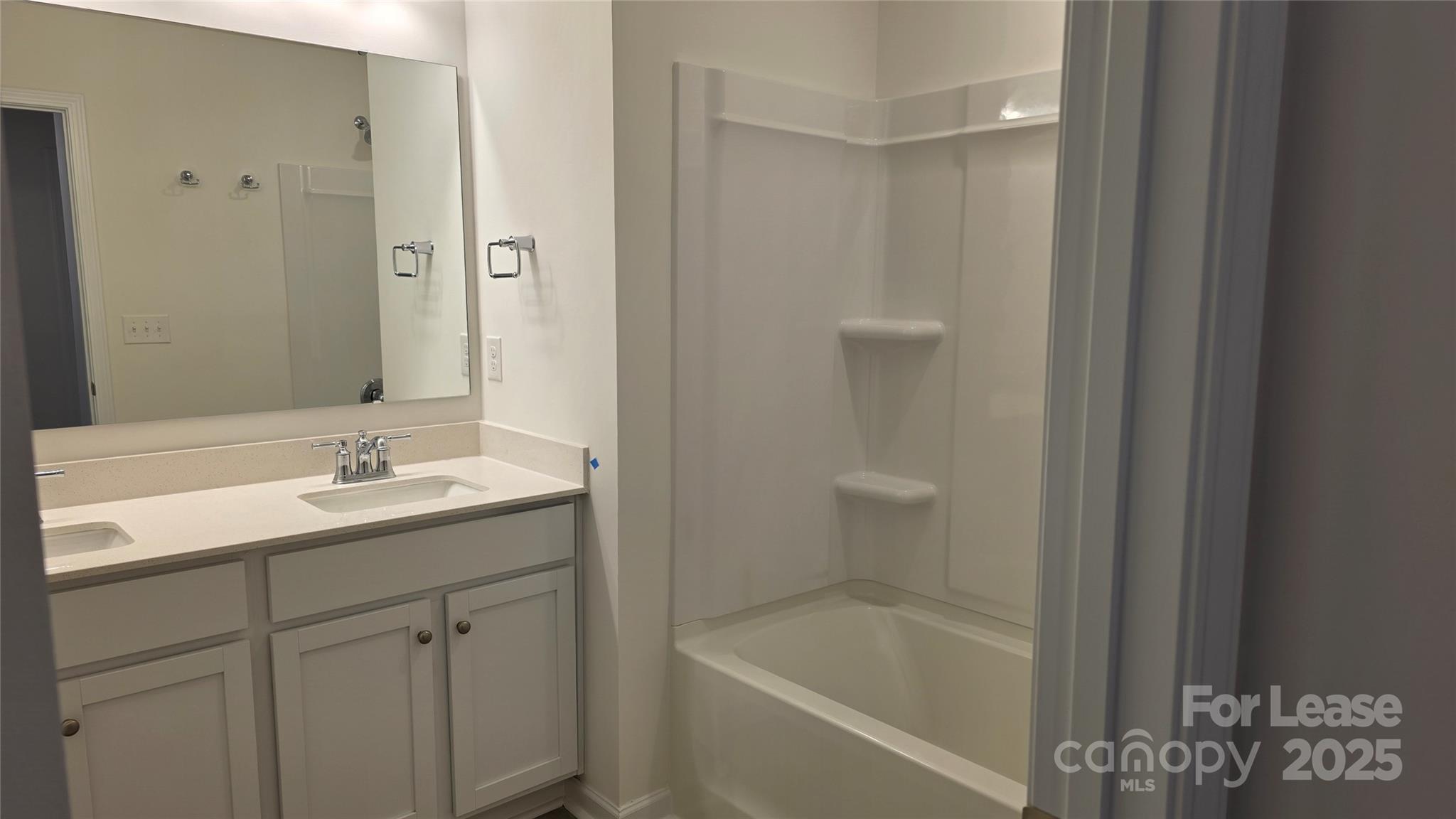 3516 Nimbell Road Monroe, NC 28110 - Photo 14 of 18 a bathroom with a granite countertop sink toilet and shower
