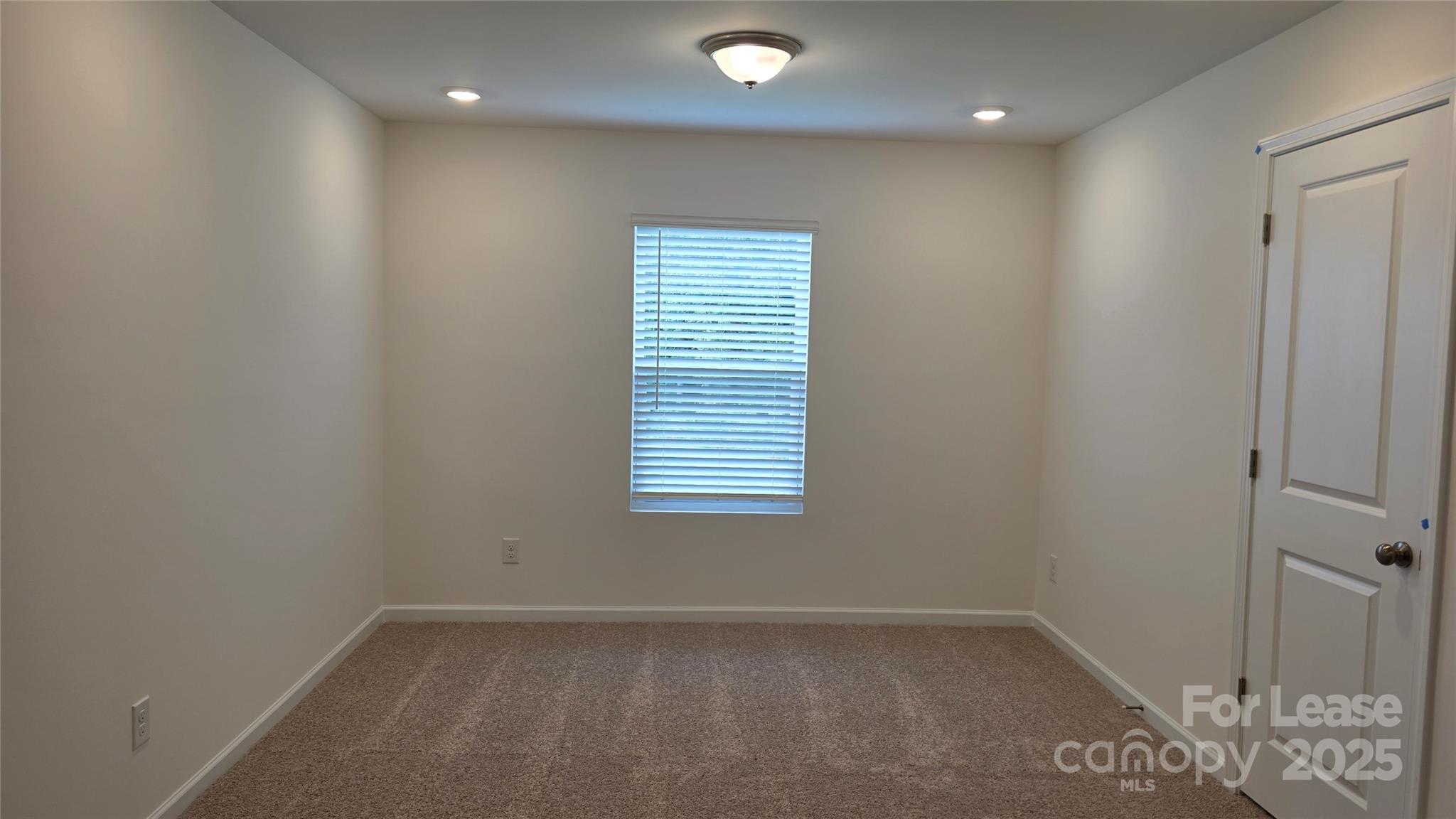 3516 Nimbell Road Monroe, NC 28110 - Photo 8 of 18 an empty room with windows