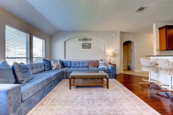 a living room with furniture and a couch
