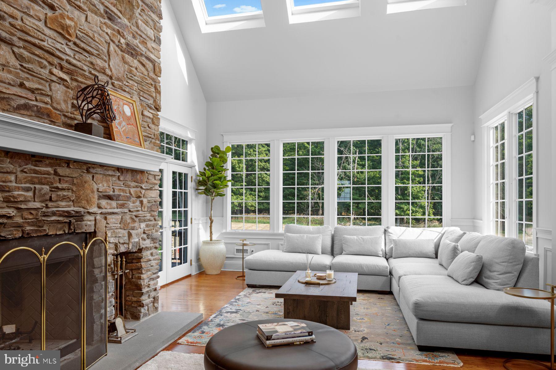 50 Dunkard Church Road Stockton, NJ 08559 - Photo 21 of 51 a living room with fireplace furniture and a large window