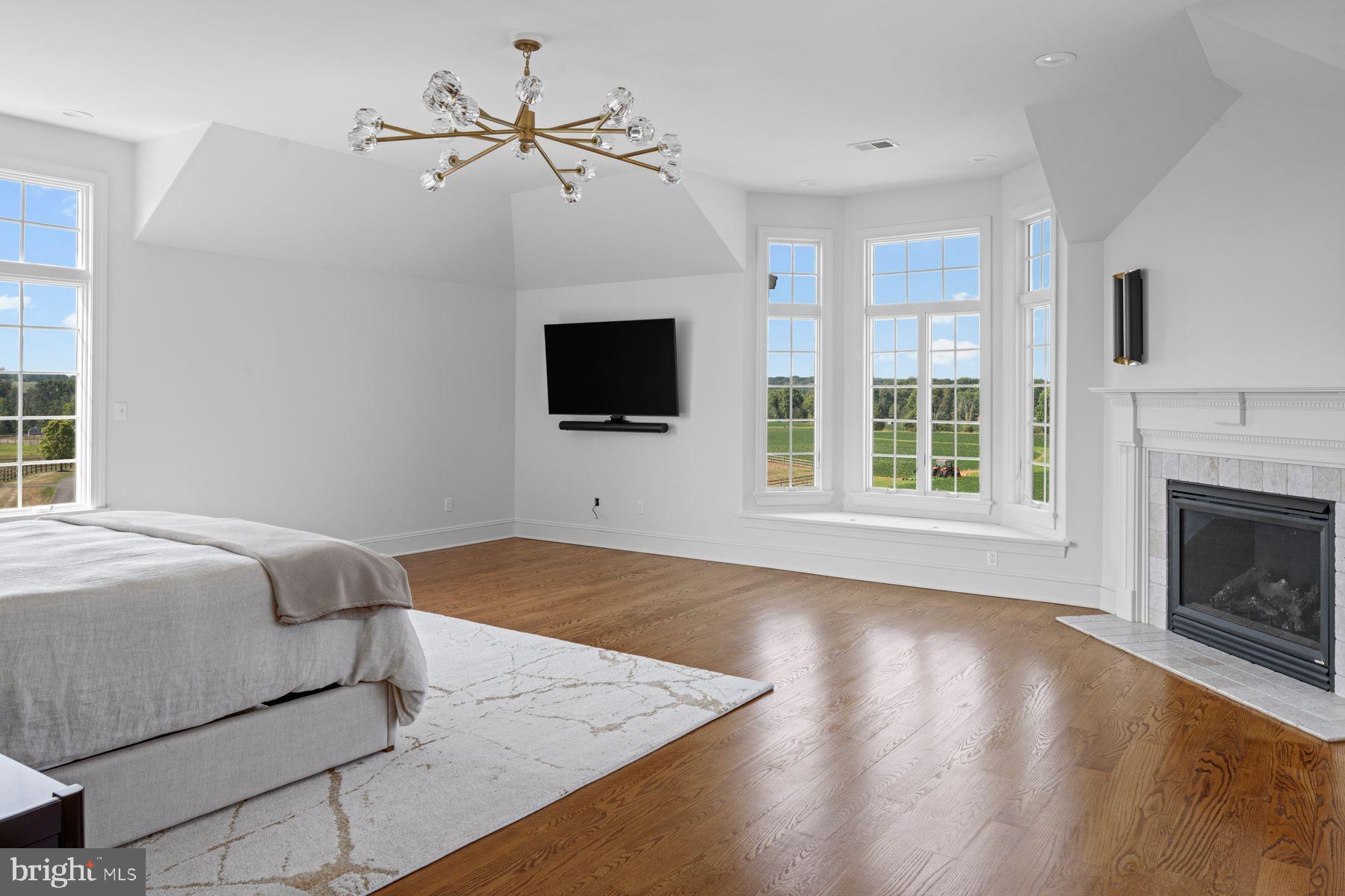 50 Dunkard Church Road Stockton, NJ 08559 - Photo 31 of 51 a bedroom with a bed and a flat screen tv